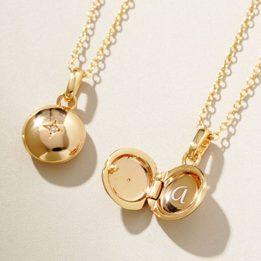 Initial gold locket necklace